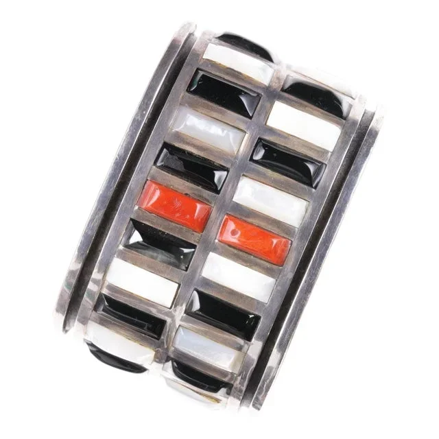 6 7/8″ Jimmie King Jr Navajo silver Coral, onyx, and Shell channel inlay Cuff Bracelet