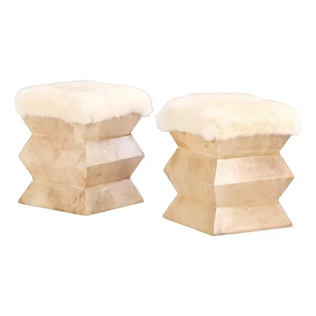 A Pair of Parchment Covered Stools of Architectural Form.