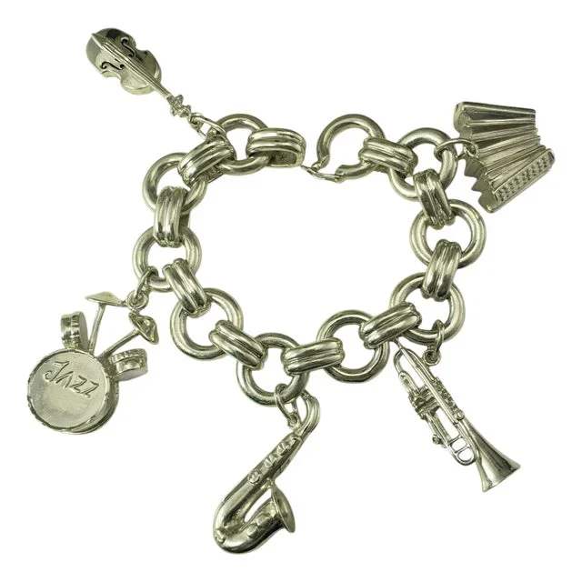 Late 20th Century Tiffany & Co. Sterling Silver Jazz Instrument Charm Bracelet