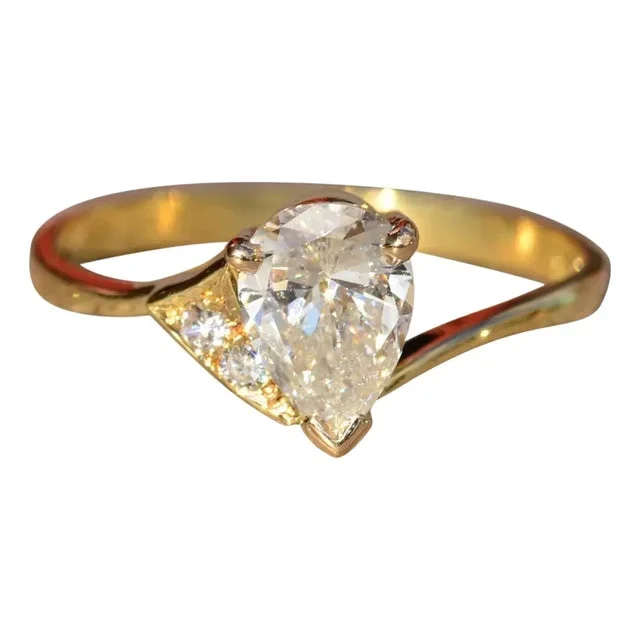The Piore: 18 Karat Yellow Gold Custom Modified Modern Bypass Diamond Ring