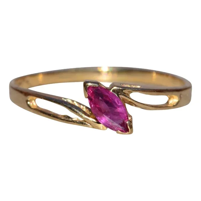 The Waubuno: Ladies 14K Yellow Gold Ruby Bypass Style Ring